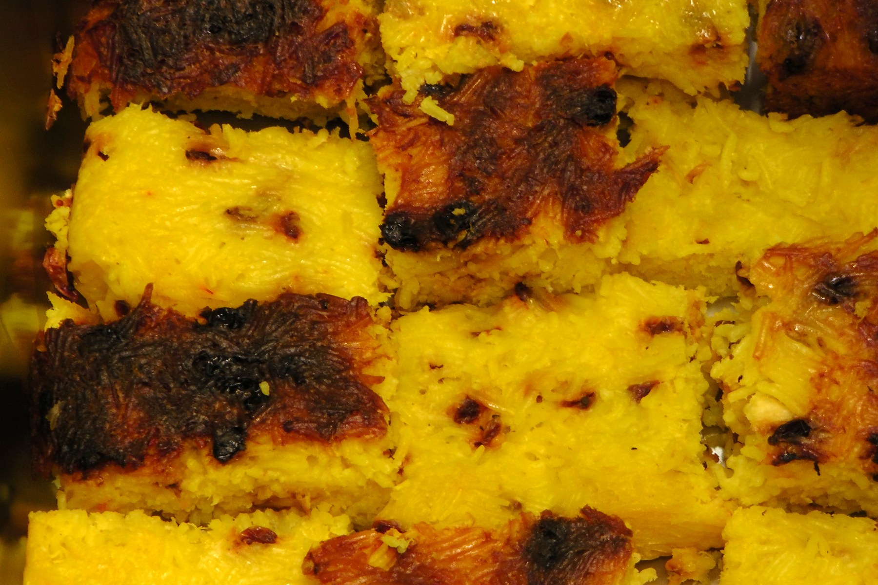 Tahchin — a golden Persian saffron and yogurt rice cake.