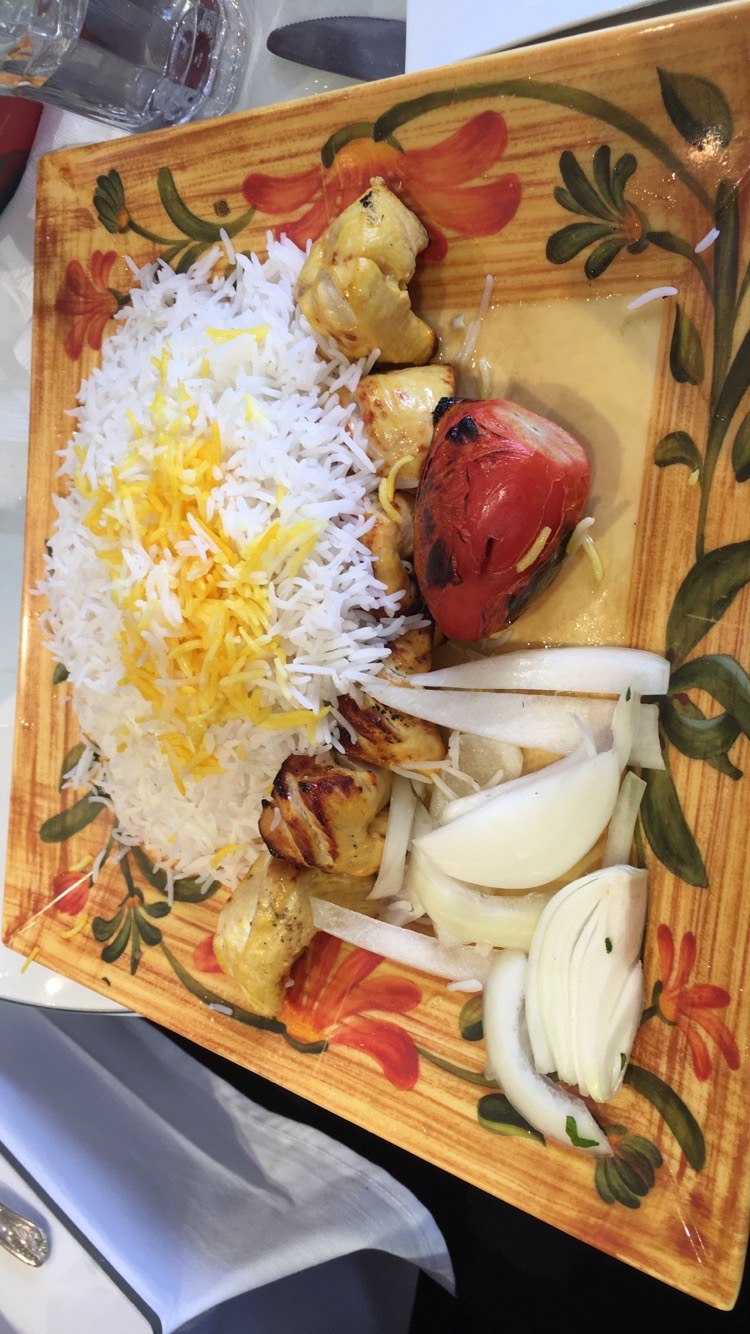 Joojeh kabab — saffron-marinated grilled chicken skewers.