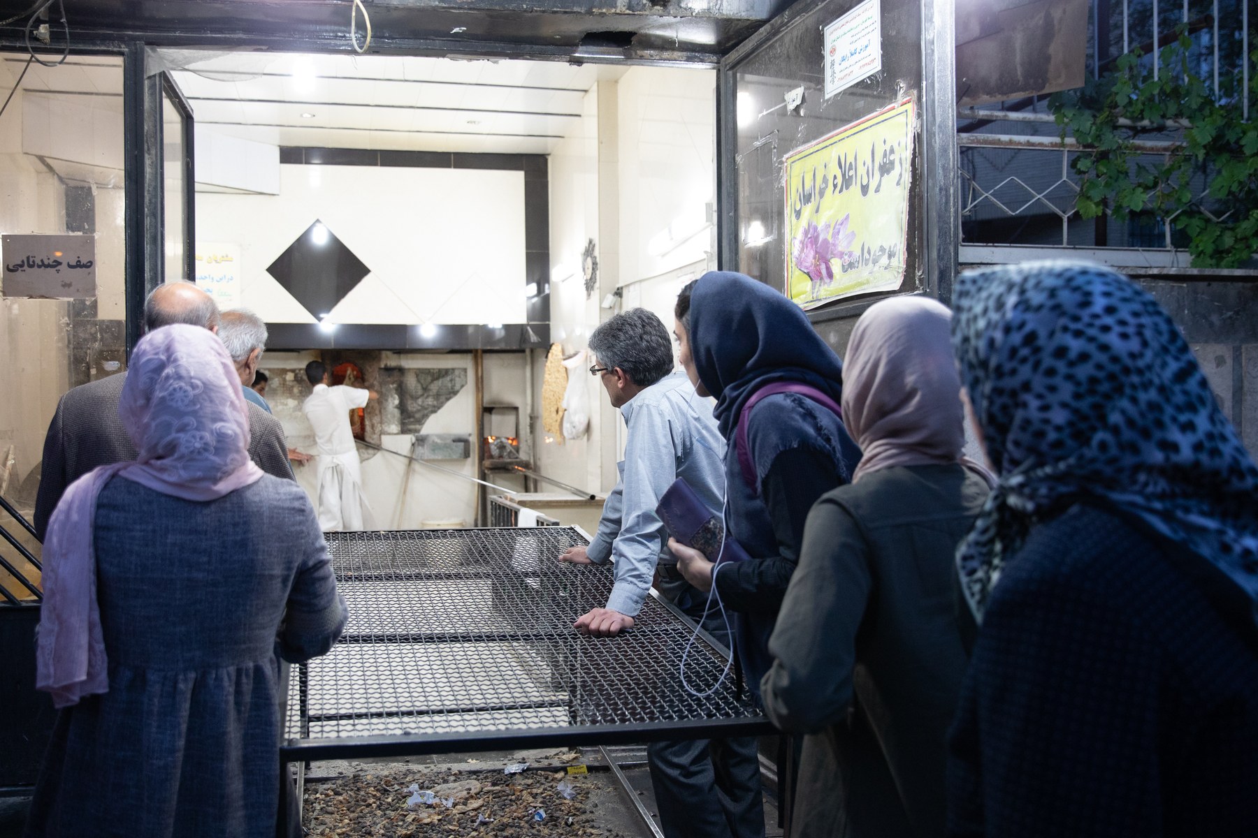 Sangak — long Persian stone-baked flatbread in a Tehran bakery.